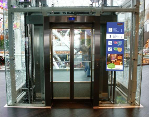 Реклама в торговых центрах в зонах ожидания лифта